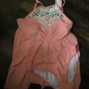 Women’s 2 piece swimsuit. It’s more of a coral shade of pink.